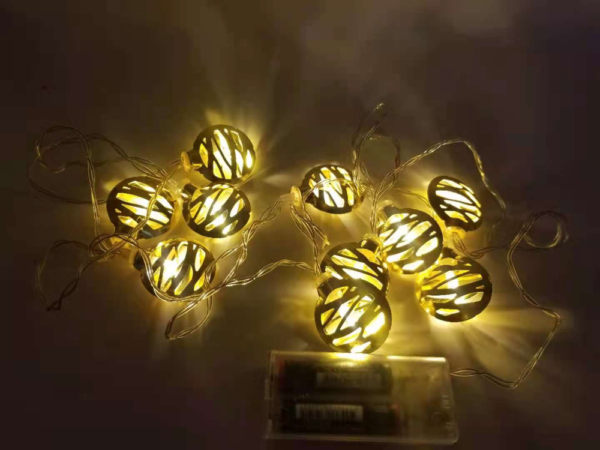LUZ CON ADORNO DE MEDALLA